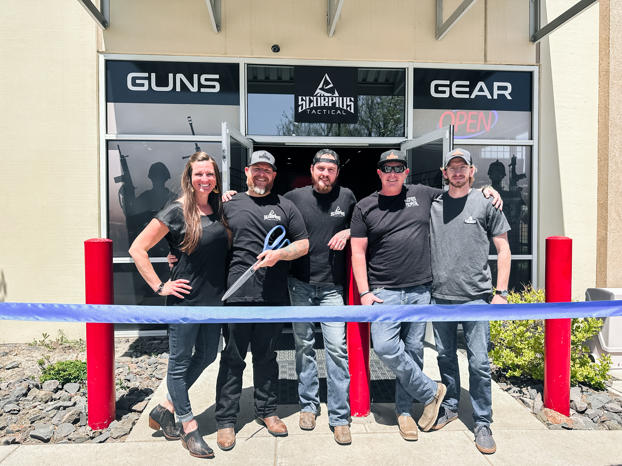 Scorpius Tactical team out front of store after ribbon cutting with Chamber of Commerce
